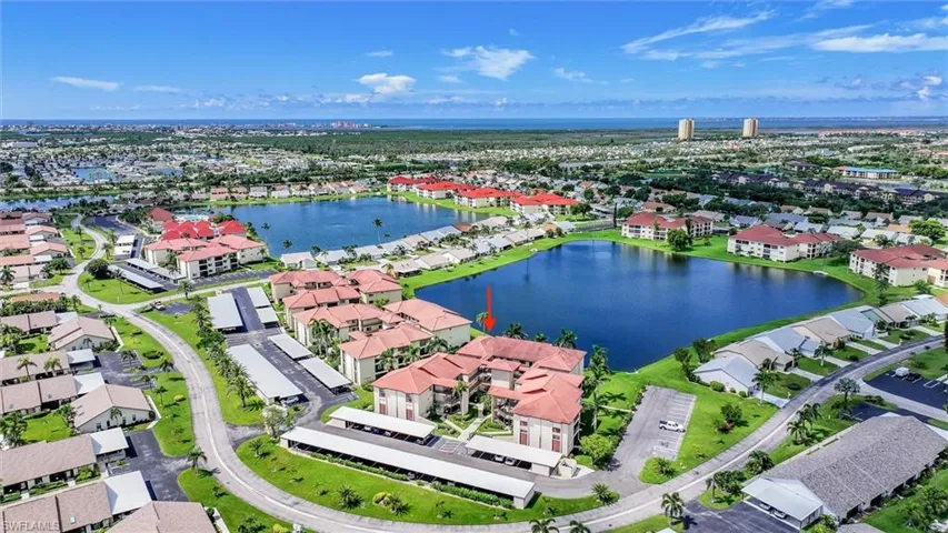 Aerial view of residential area with a large body of water