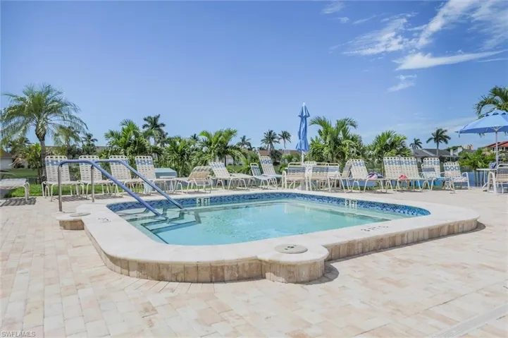 View of swimming pool with a patio area and a swimming pool