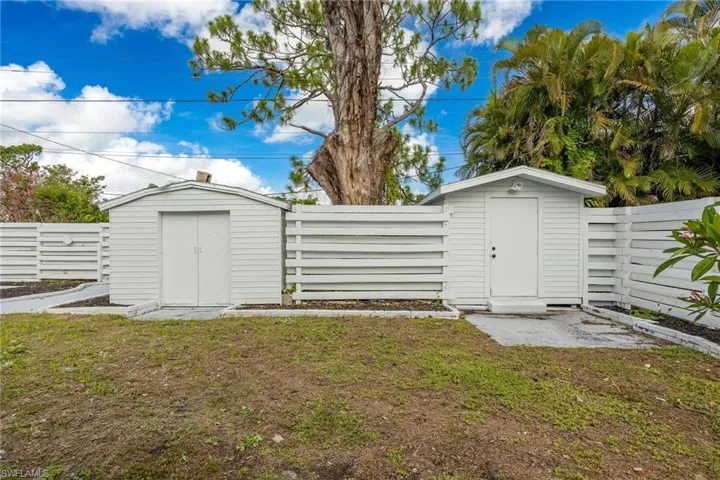 View of shed featuring a fenced backyard
