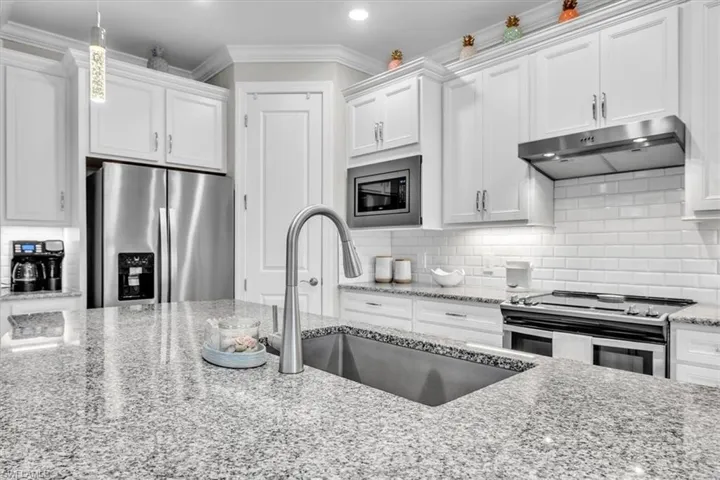 -featuring granite and single bowl sink