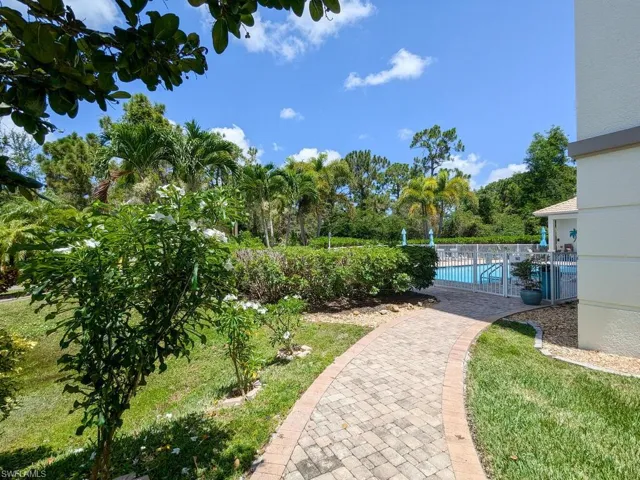 View of yard featuring a community pool