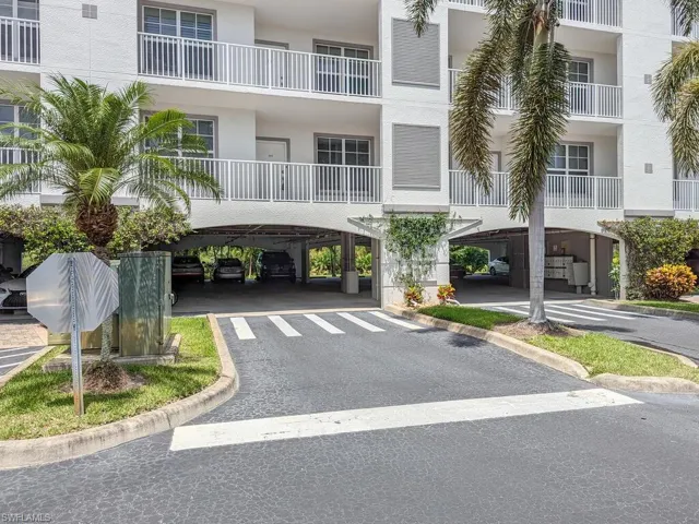 View of property featuring a carport