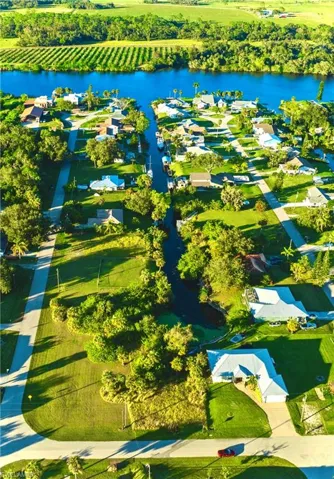 Drone / aerial view with a rural view and a water view