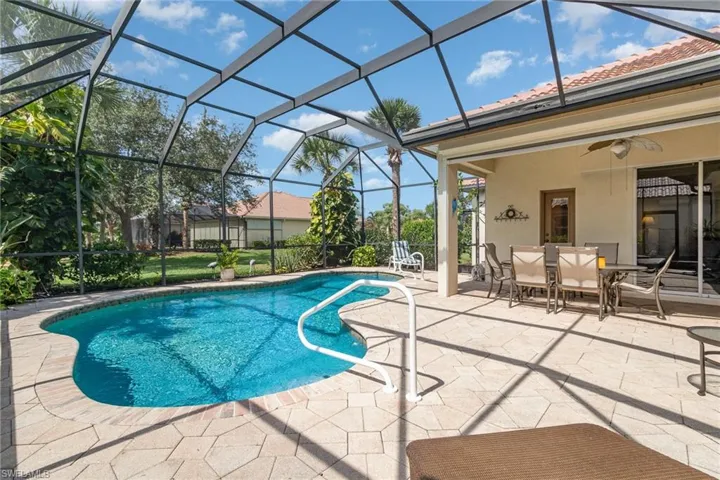 Expansive swimming pool area featuring and outdoor space