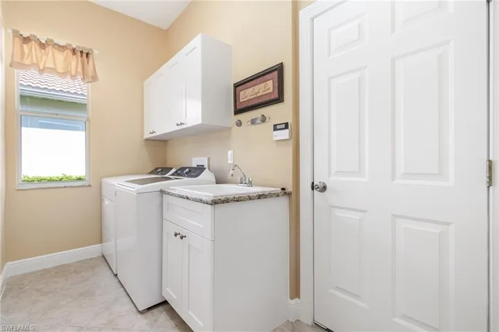 Laundry room with washer and dryer.