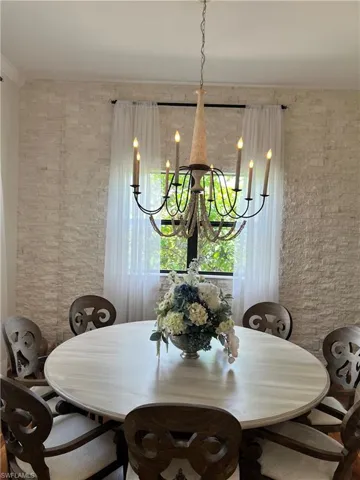Dining room with an inviting chandelier