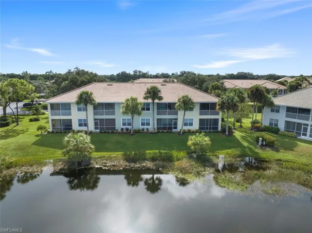 Rear view of property featuring a water view