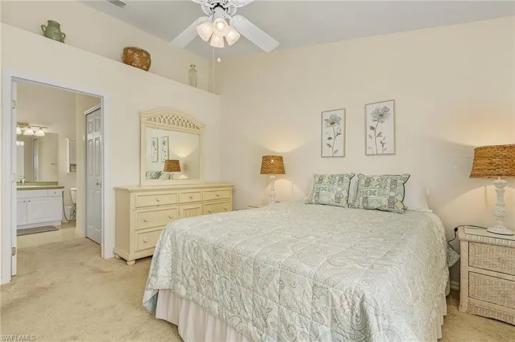 View of lake, Spacious suite with vaulted ceiling, walk-in closet
