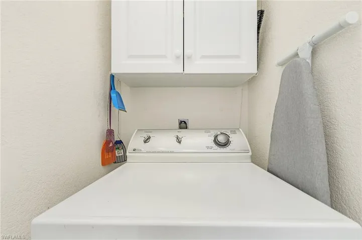 Off Kitchen by interior garage door.  Washer and Dryer included.