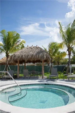 View of swimming pool with a patio