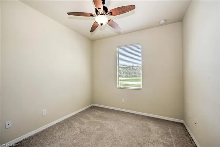 Bedroom 2 with lighted ceiling fan!