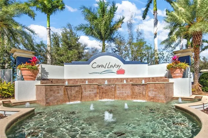Stately fountain entry and welcome to "Coral Lakes"!