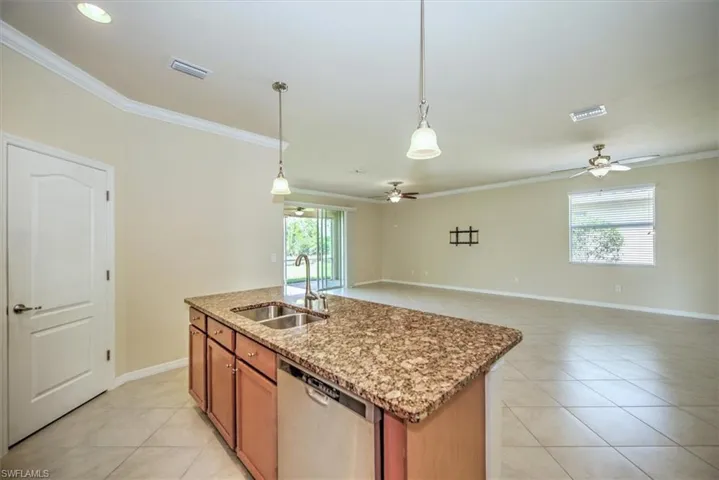 View of kitchen island to living room - dining room and main living area!