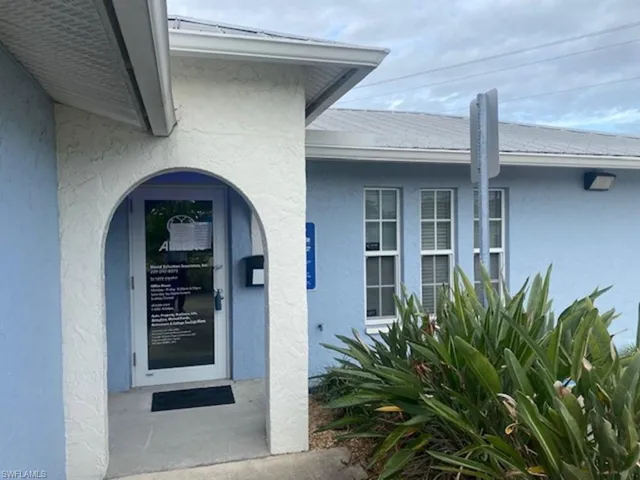 One of two front entrance doors