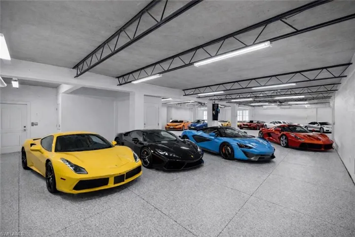 12 Plus Car Garage. Cars Added Digitally In Photograph