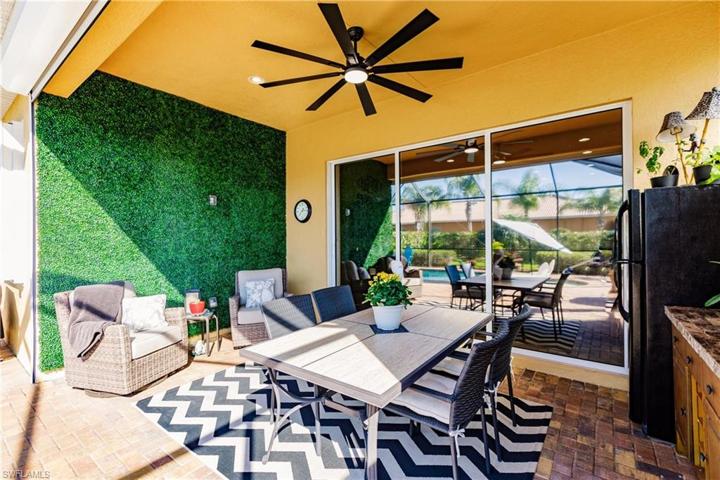 DECORATIVE GRASS WALL LOOKS AMAZING! THIS HOME TRULY NEEDS TO BE SEEN IN PERSON TO APPRECIATE IT'S BEAUTY!