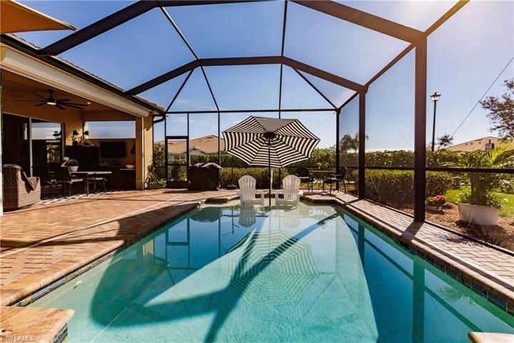 SPA ON THIS END OF THE POOL & SUN TANNING ON THE FAR END OF THE POOL! THIS IS DEFINITELY THE HOME YOU HAVE BEEN WAITING FOR!