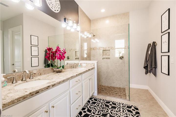 UPGRADED MASTER SHOWER IS BEAUTIFUL! PLENTY OF FRESHLY PAINTED CABINETS WITH NEW HARDWARE!