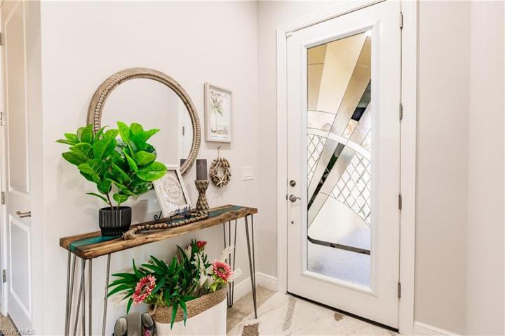 BEAUTIFUL NEW GLASS ENTRY DOOR THAT IS IMPACT RESISTANT!
