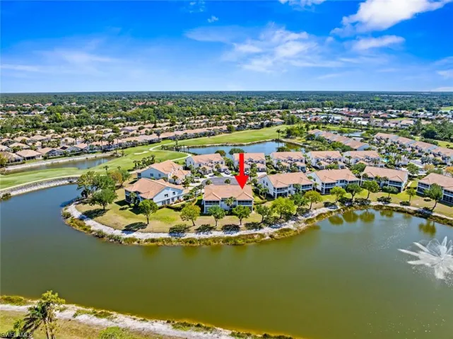 Aerial view with a water view and a residential view