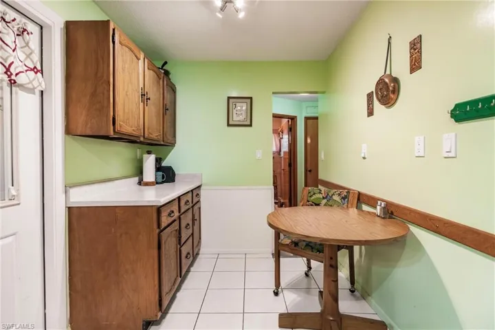 Kitchen with light tile floors