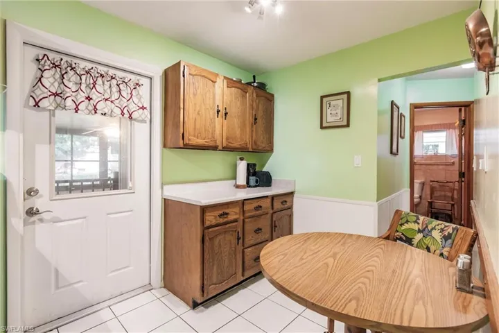 Kitchen featuring light tile floors