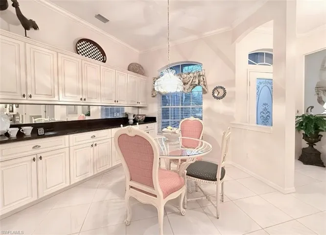Breakfast Room w/ Built In Cabinets and Buffet