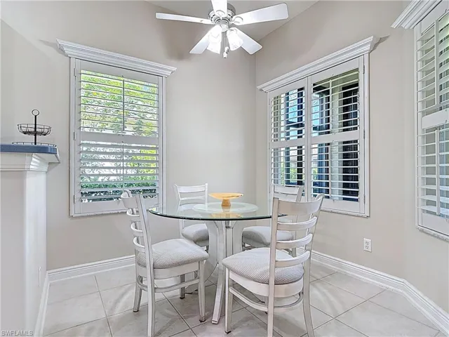 Breakfast nook area featuring plenty of natural light.