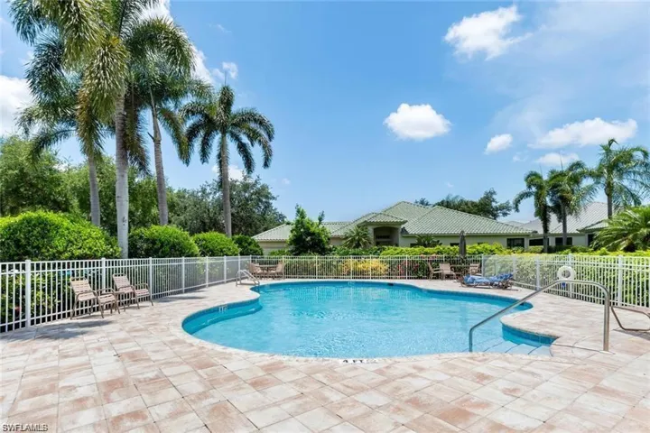 Community pool featuring a patio area