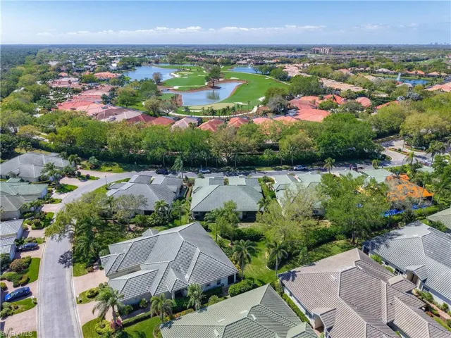 Drone / aerial view featuring a water view and a residential view