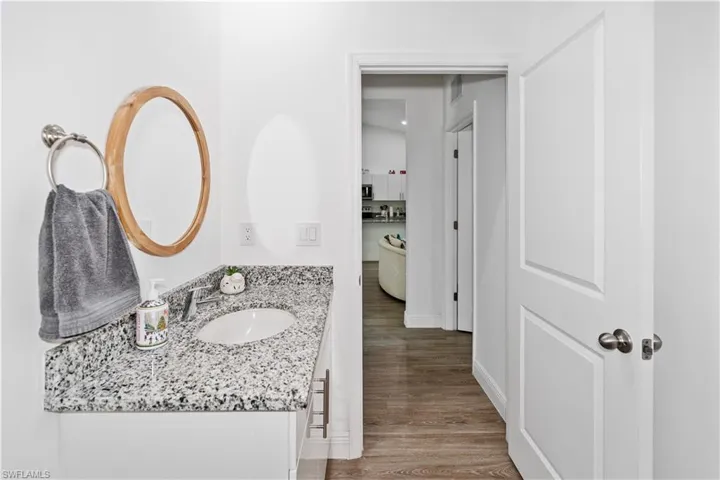 Bathroom featuring vanity and light wood-type flooring