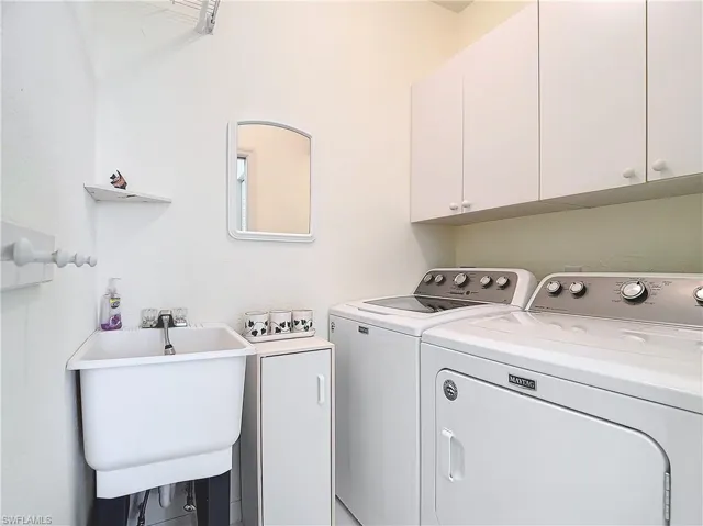 Laundry Room with Utility Sink and Storage Cabinets