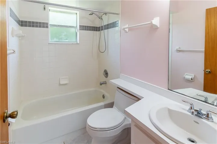 Full bathroom featuring vanity and tub / shower combination