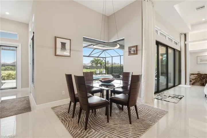 High ceilings and polished tile flooring enhance the open interior