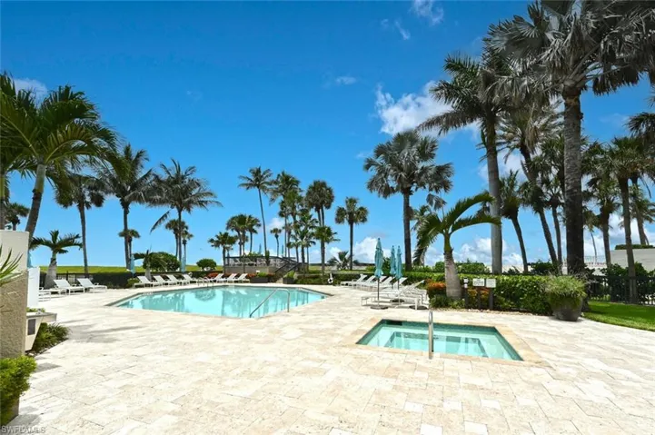 Coral stone pavers on the entire pool deck