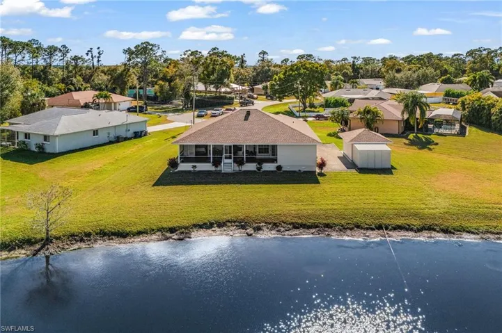located on an oversize .41 acre lot with 191’ of lake shoreline is a MUST see