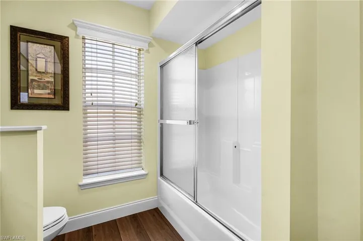 The guest bathroom has tub/shower combination, dual sinks, and large linen closet for extra storage
