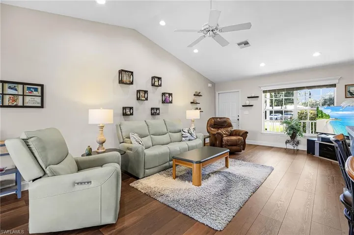 Enjoy the wonderful OPEN split floor plan, vaulted ceilings, uxury woodgrain plank vinyl floor in living areas, laundry room and bathrooms for easy upkeep.