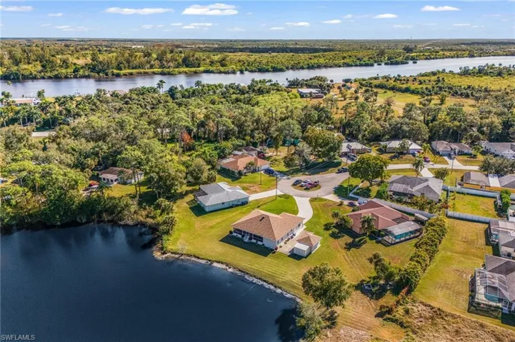located on an oversize .41 acre lot with 191’ of lake shoreline is a MUST see