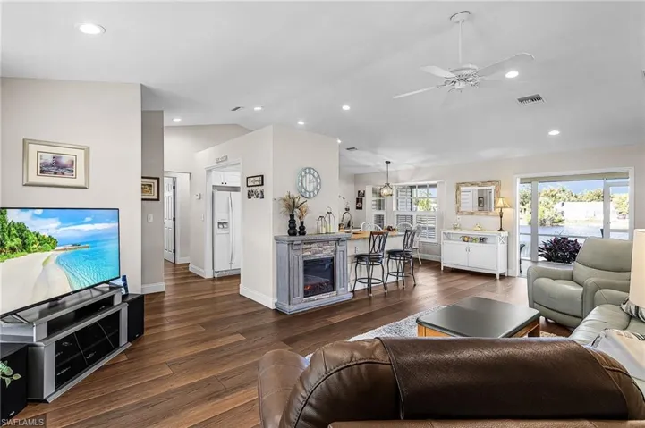 Once you are inside it will be hard to take your eyes off the beautiful lake view through French doors in the living room.