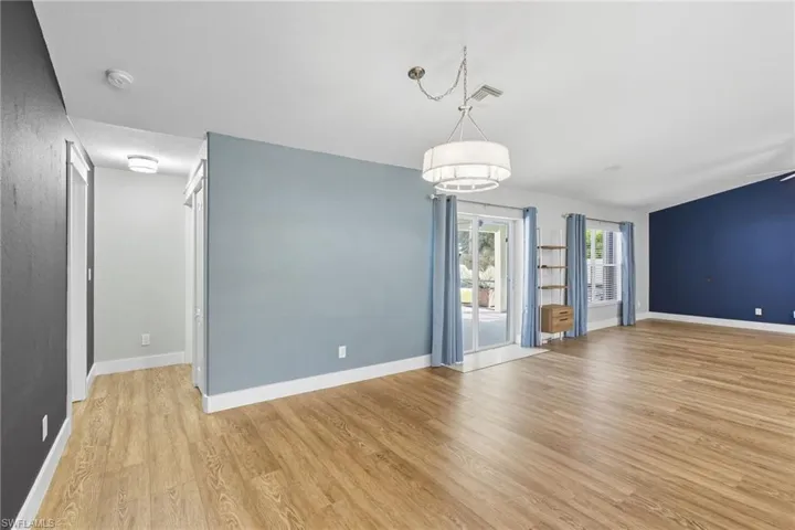 Family Dining Area with View of Hall to Bedroom 1 and Guest/Pool Bath