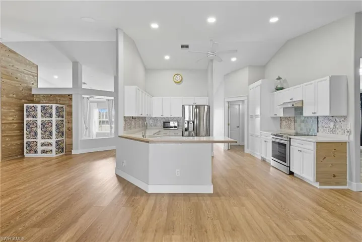 Family Room View of Large Kitchen Area