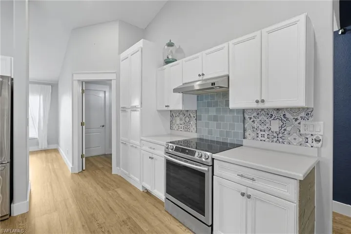 Open to Laundry and Formal Dining / Living