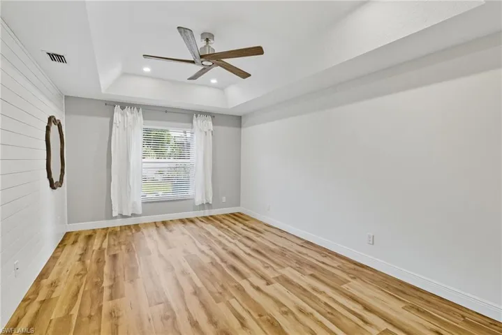 Large Primary Bedroom featuring a "Tray" ceiling