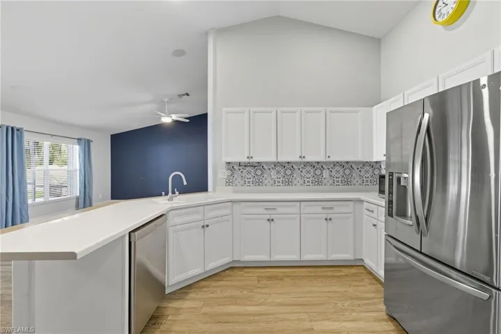 Kitchen with Stainless Appliances, Corian Countertop