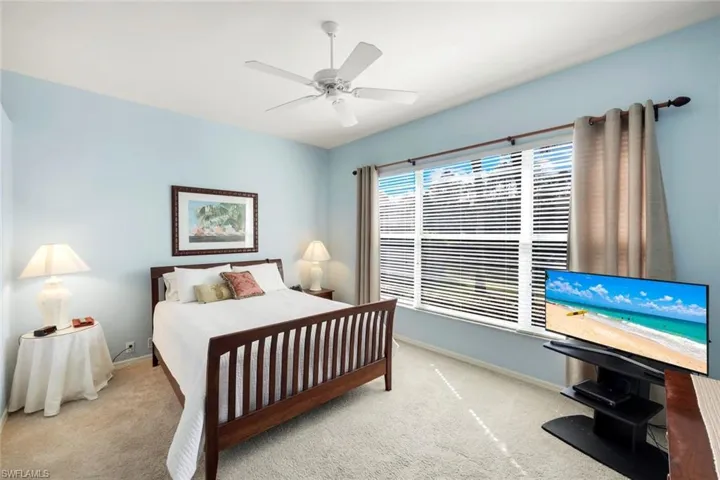 Dining space featuring ornamental molding, wood-type flooring, a ceiling fan, and recessed lighting