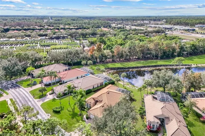 Aerial view of residential area with a large body of water