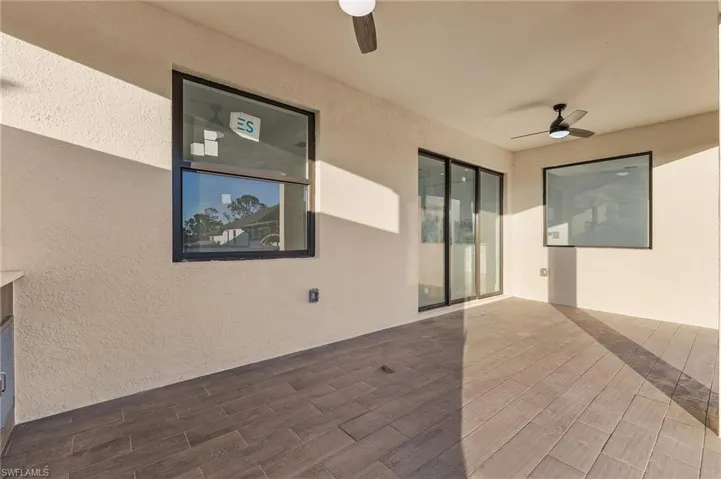 View of patio / terrace featuring a ceiling fan