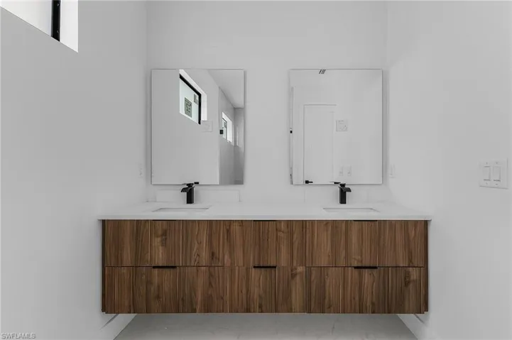 Full bathroom with double vanity