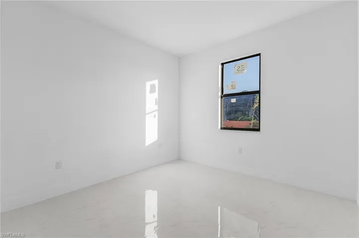 Empty room featuring healthy amount of natural light